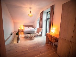 Inspirace: Doplňkové světlo vytvořilo horskému apartmánu nezaměnitelnou atmosféru